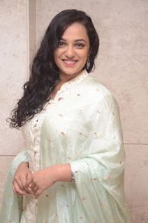 nitya menon at 100 days of love audio launch nitya menon at 100 days of love audio launch