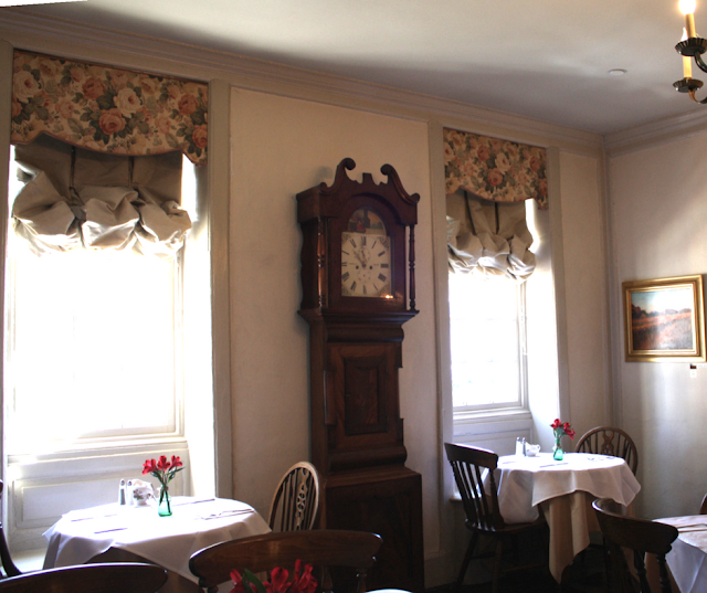 Charming grandfather clock and overall elegant atmosphere at Reynold's Tavern