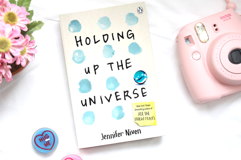 young adult jennifer niven holding up the universe