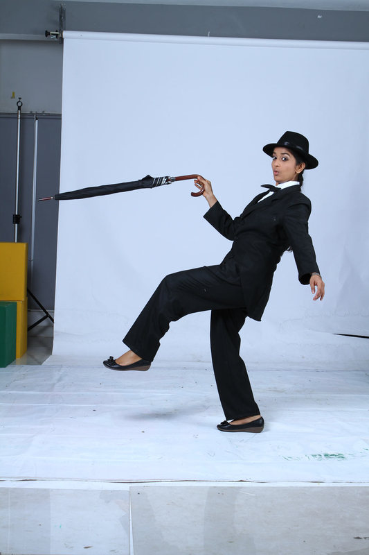 Meera Jasmine latest Photoshoot as Charlie Chaplin for Anbulla Kamal movie glamour images