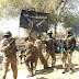 Interesting Photos: Buhari Receives Boko Haram Flag,Says Not East Madness Must Stop