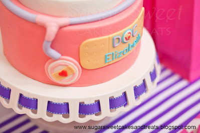 Close up of handmade gumpaste Stethoscope for doctor themed cake.