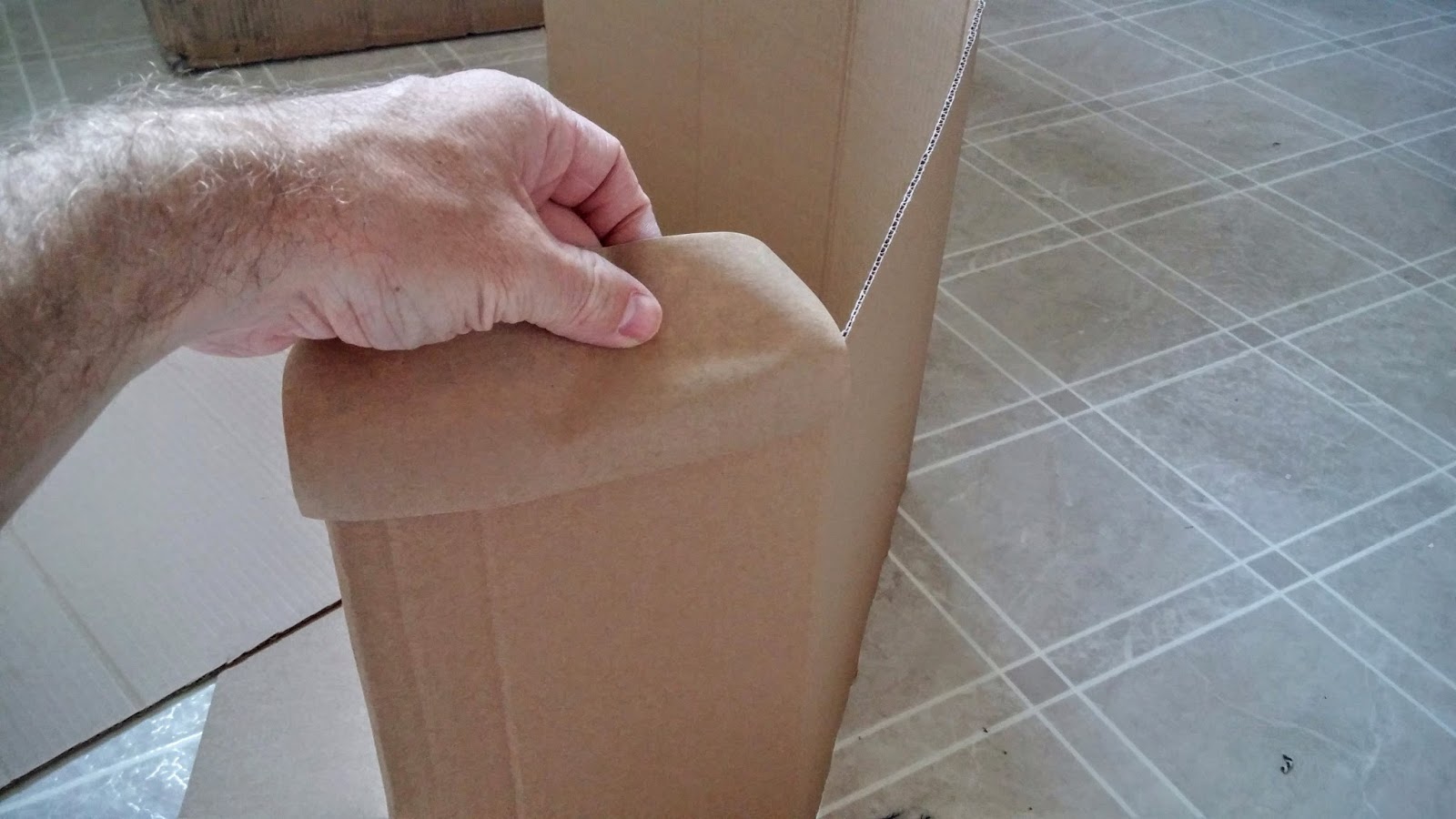 How to make a nice looking garbage can out of a cardboard box