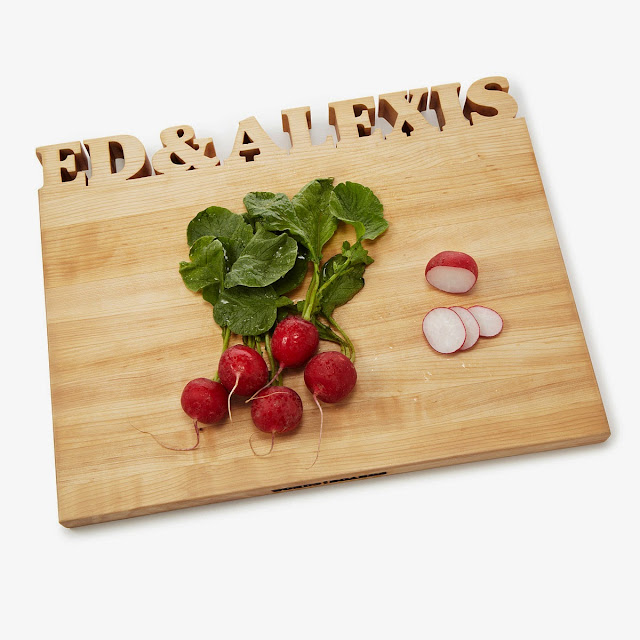 http://www.uncommongoods.com/product/personalized-cutting-board