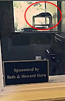 Beth and Howard Stern Donate a Sign to "Dogs and Cats Forever"