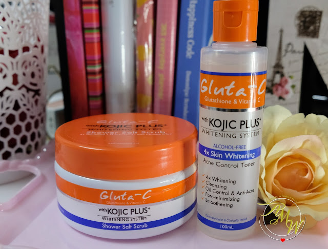 a photo of Gluta-C with Kojic Plus Shower Salt Scrub and Acne Control Toner available at Sampleroom.  WRitten by Askmewhats Nikki Tiu