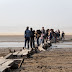 Emerge centenario puente al secarse lago en China