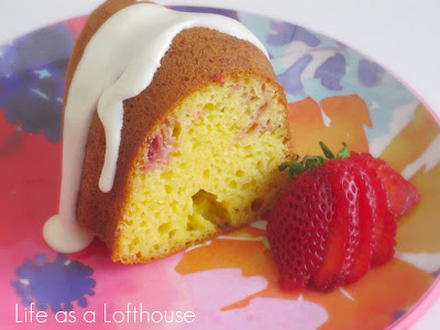 Lemon Berry Bundt Cake is a moist, soft cake full of strawberry and lemon flavor with a lemon glaze drizzled over the top. Life-in-the-Lofthouse.com