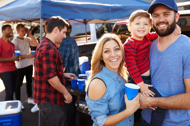 Portrait of Family Group Tailgating in Stadium Car Park