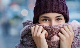 Woman in beanie and scarf