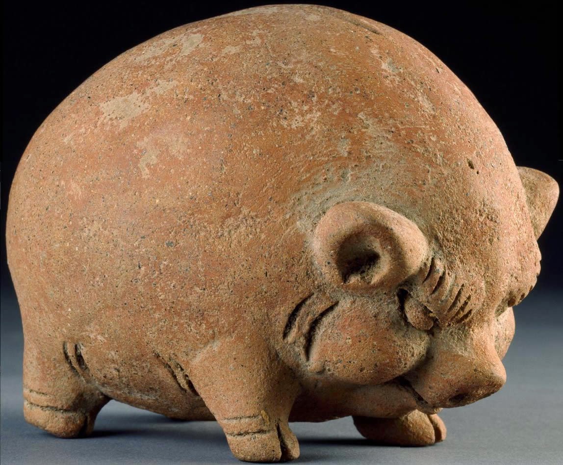THIS and THAT The origin of Piggy Banks