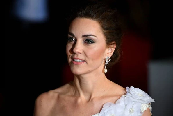 Kate Middleton, the Duchess of Cambridge wearing Princess Diana's pearl earrings, Alexander McQueen one shoulder gown