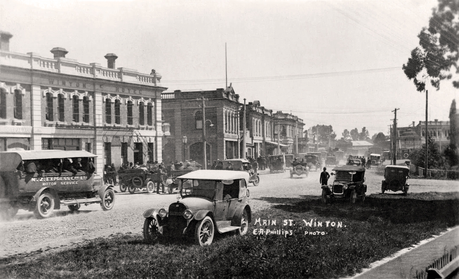 transpress nz vehicles in the Main Street of Winton, Southland, 1920s