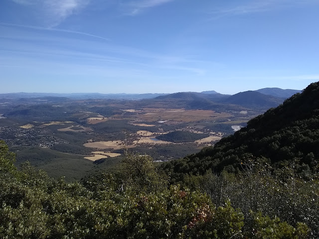 sandy spots among low hills