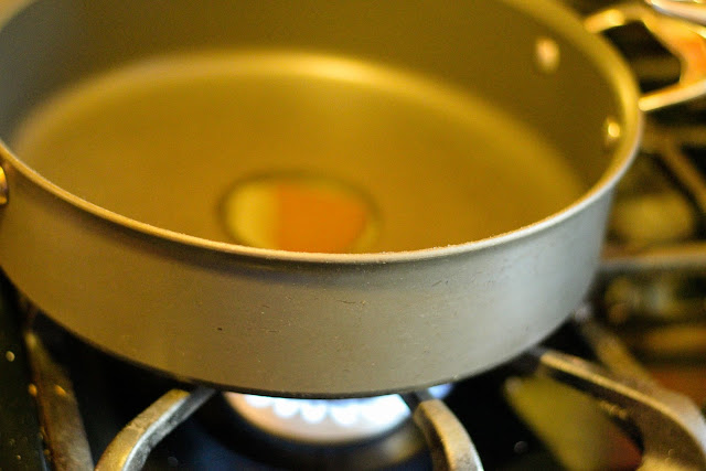 A little extra virgin olive oil in a deep skillet, on the stove.  