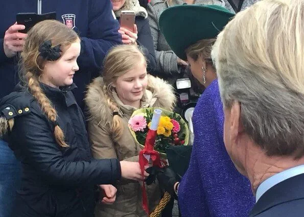 2018 Dutch Organic Trade Fair at IJsselhallen Convention Center in Zwolle. Queen Maxima wore Natan dress and Natan shoes, green diamond earrings