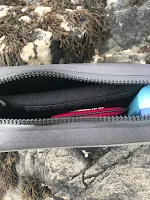 inside waterproof bag on rock