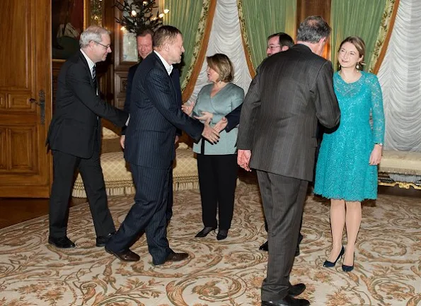 Prince Guillaume and Princess Stéphanie at New Year's reception. Princess Stéphanie wore Prada Lace Dress and Prada leather pumps, shoes, diamond earrings