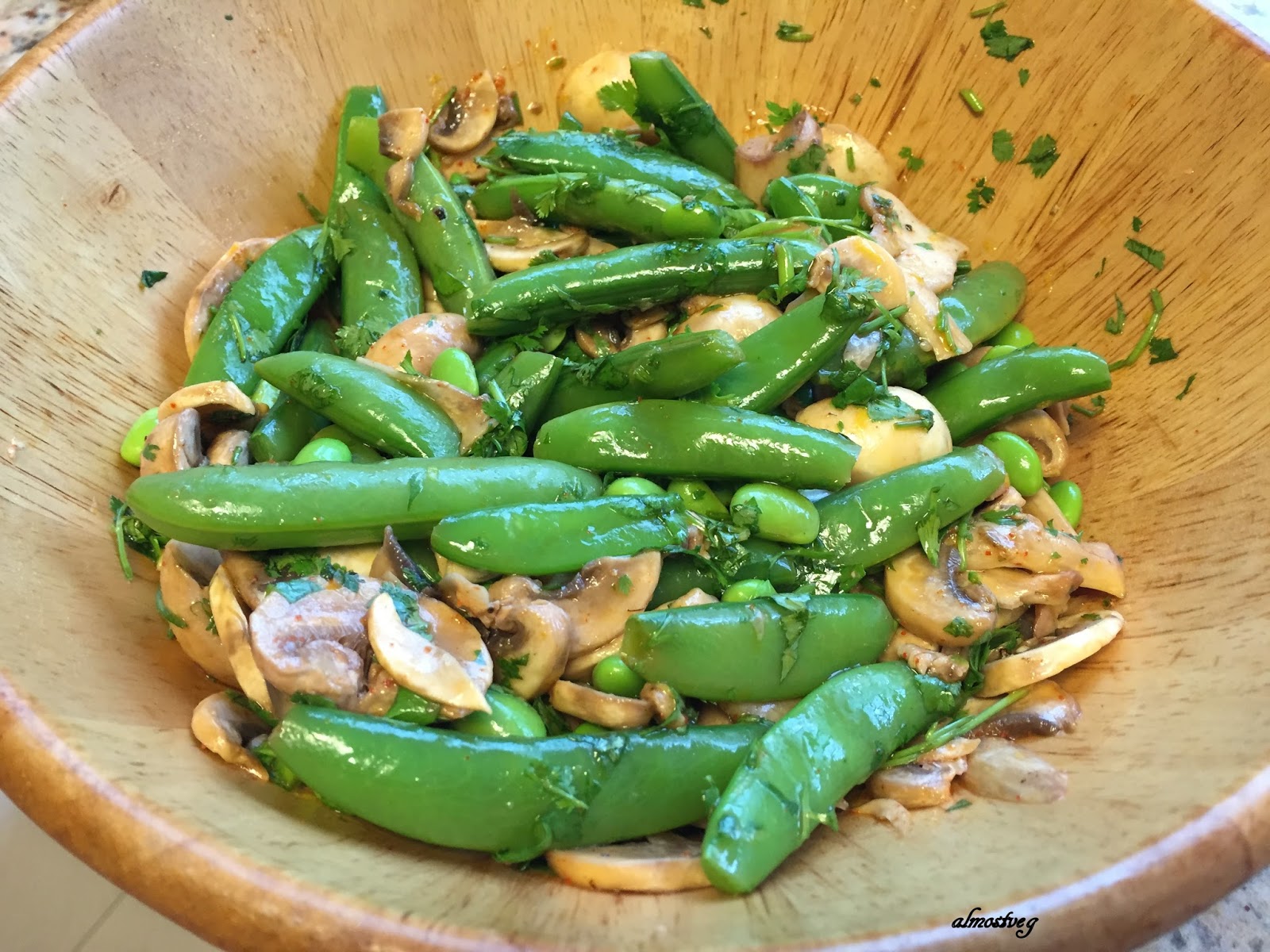 Mushroom,sugar snap peas and edamame salad in an Asian dressing