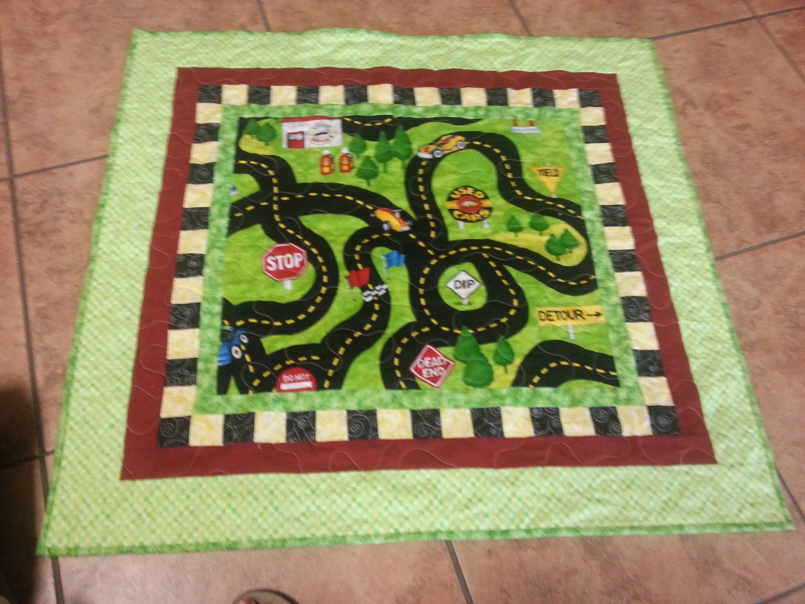 Mel's quilting blog Road Quilt is done.