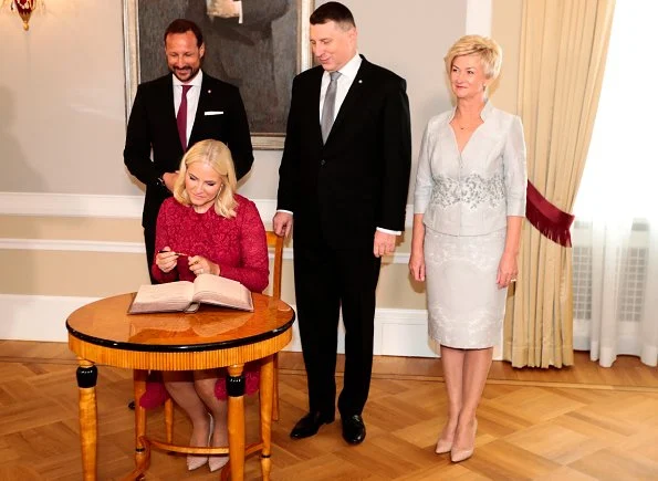 Crown Princess Mette Marit wore Valentino Lace Coat for visit to Latvia. President of Latvia, Raimonds Vējonis and First Lady Iveta Vējone