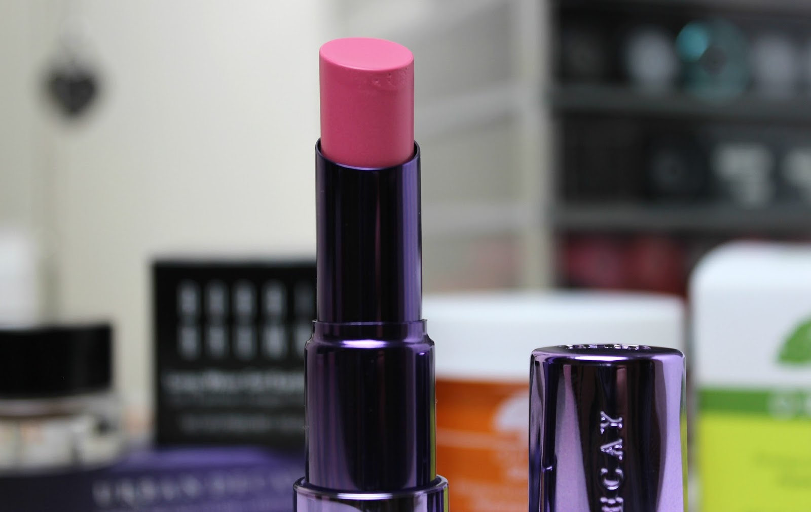 A picture of Urban Decay Sheer Revolution Lipstick in Sheer Obsessed