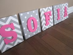 hanging pink purple decor on striping wallsbaby letters for nursery wall olivia candy style with sweet coloured feminine concept modern vintage