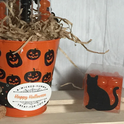 Halloween treat holders using clear tiny treat boxes and treat tubes