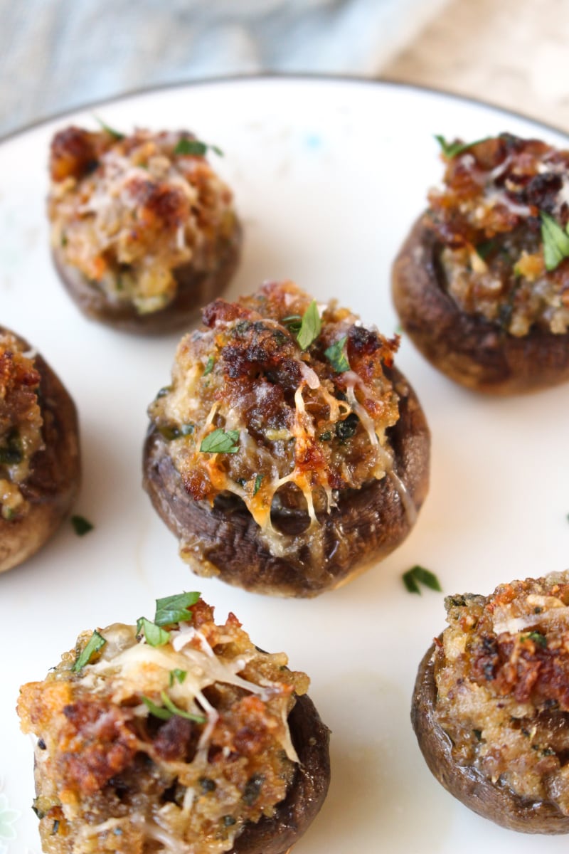 The Best Sausage Stuffed Mushrooms are cheesy and tender on the inside and have a golden crust on the outside.  This recipe is a classic that you will want to make again and again! #appetizer #mushrooms #sausage