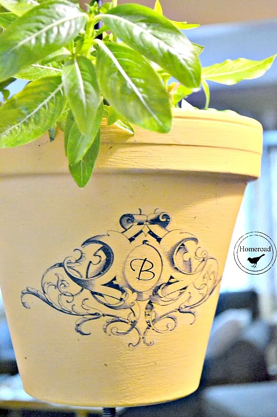 Wrought Iron Hanging Planter pot with a transfer
