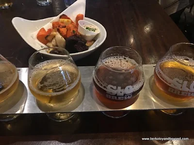 roasted roots and sampler beer flight at The Brew at SLO Brew in San Luis Obispo, California