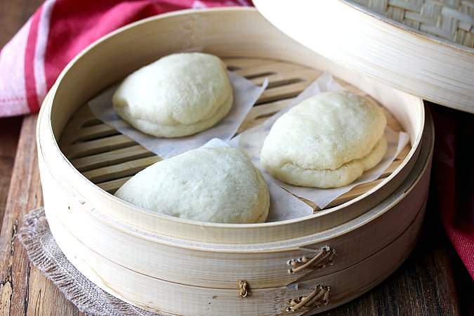 Bao Buns in a bamboo steamer Bao Buns in a bamboo steamer
