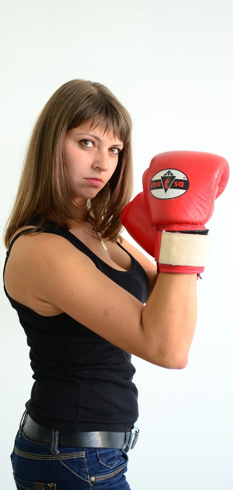 Woman with boxing gloves. Woman with boxing gloves.