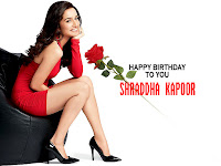 shraddha kapoor birthday whatsapp status video wallpaper, shraddha kapor sitting on sofa in red skirt with black pencil heels sandal.