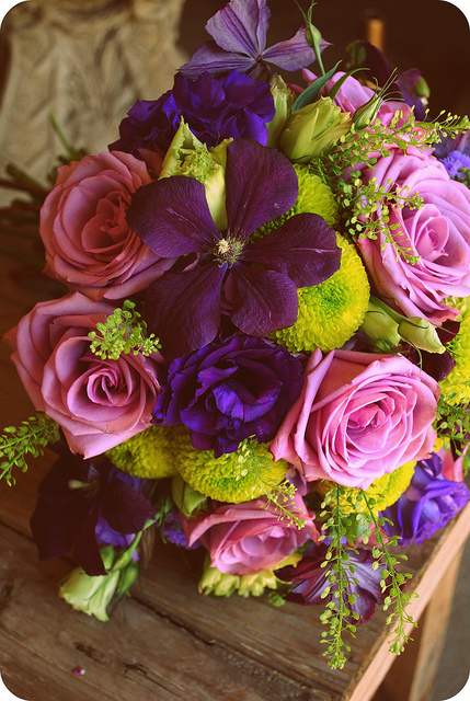 The deep royal purple clematis vine completed this bouquet to the classic 