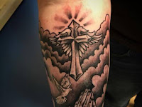 Arm Cross With Clouds Tattoo Designs