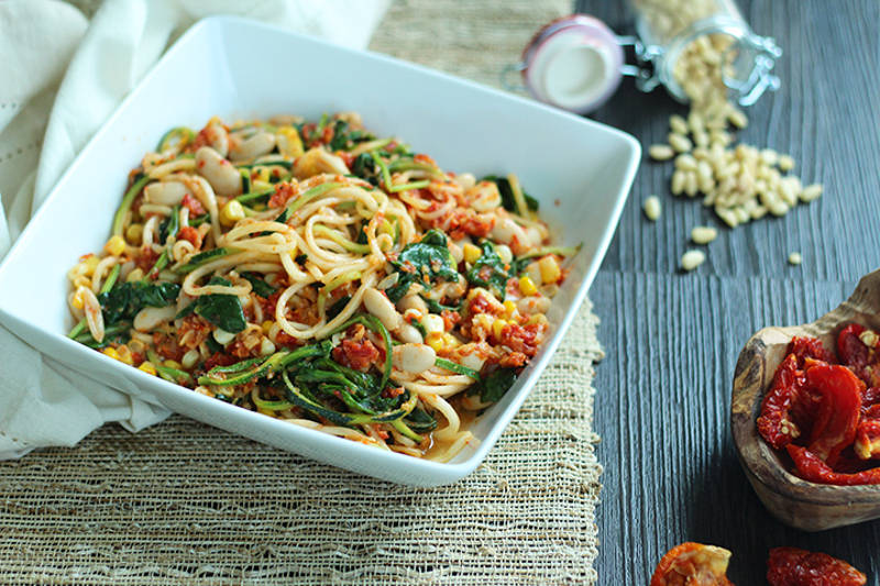 Sundried Tomato Pesto Zucchini Pasta with Corn, Beans and Spinach 