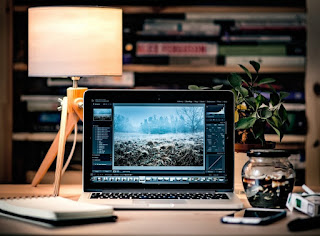 How to Get More Traffic by Guest Blogging Laptop, Smartphone and Notebook Image