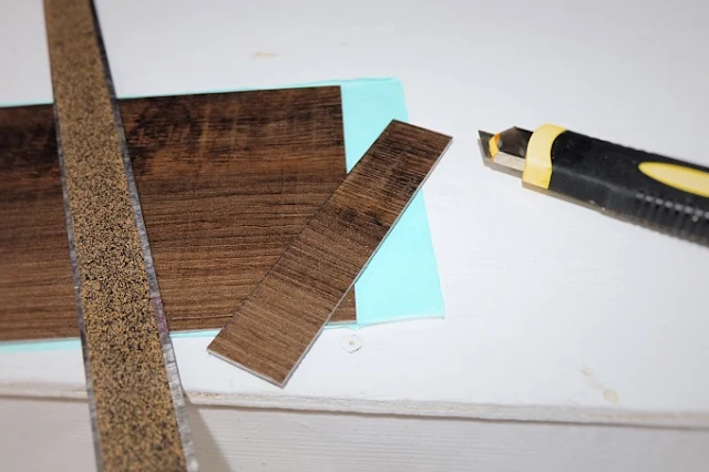 cutting the wood look vinyl plank tile