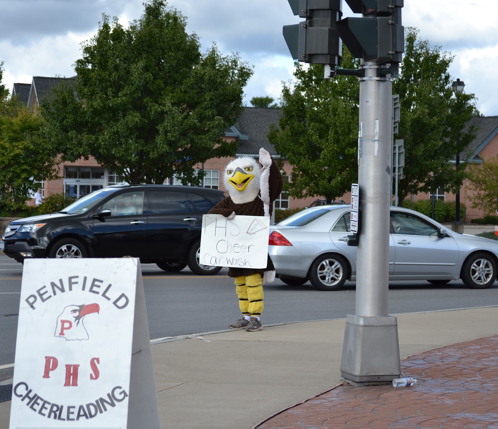 Penfield Youth Football & Cheer 2012 PHS Cheerleader Car Wash