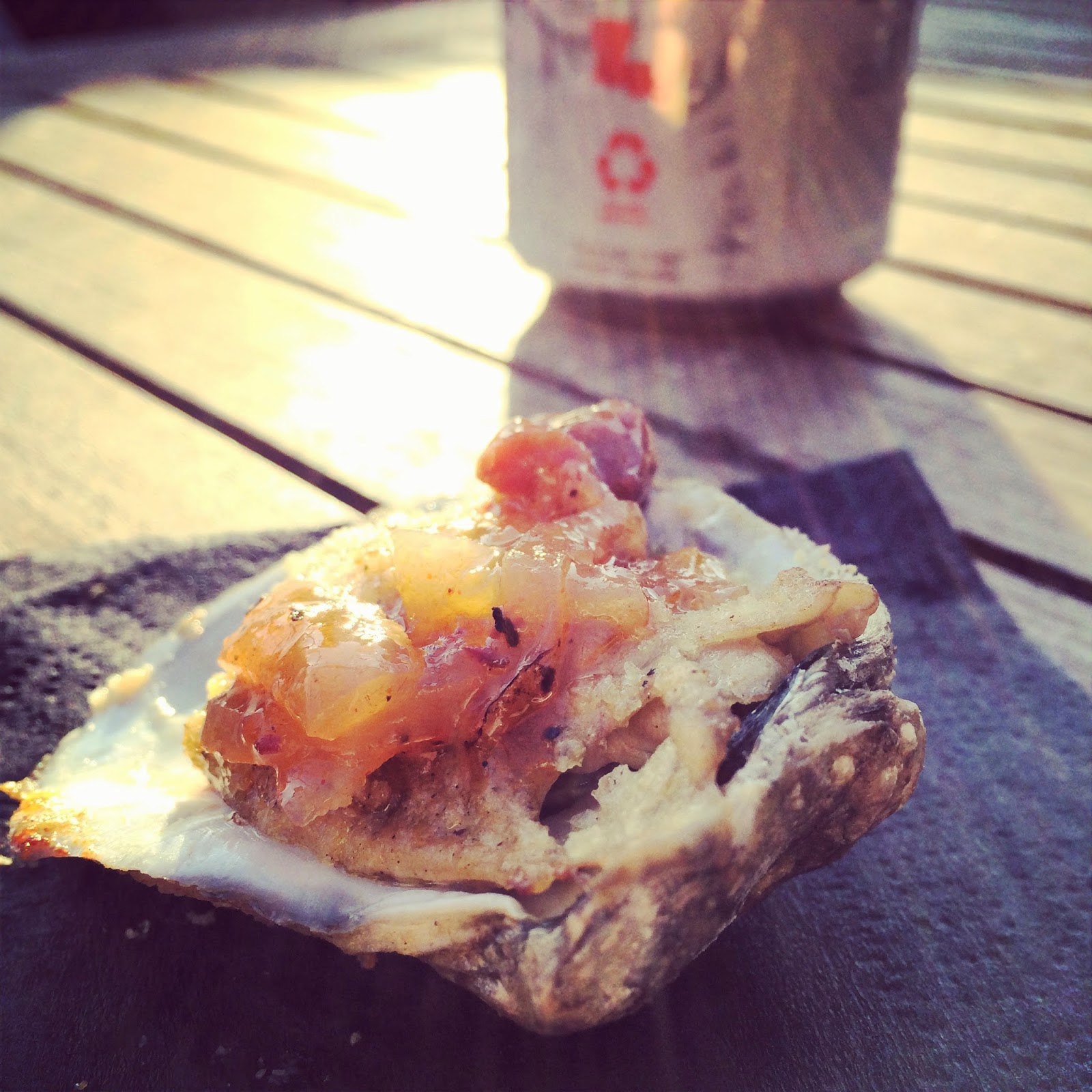 Charbroiled Louisiana Gulf Oyster with Herbed Lemon-Horseradish Brown Butter