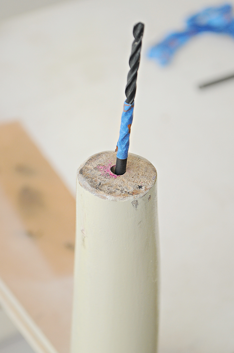 How to drill a hole into a furniture leg to add a screw-on caster. How to drill a hole into a furniture leg to add a screw-on caster.