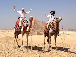 Riding camels in Giza