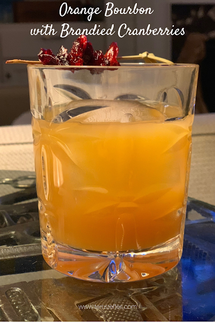 Orange Bourbon Cocktail with Brandied Cranberries