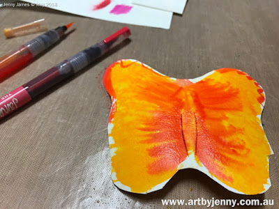 butterflies art journal page using stamps and other mixed media craft supplies