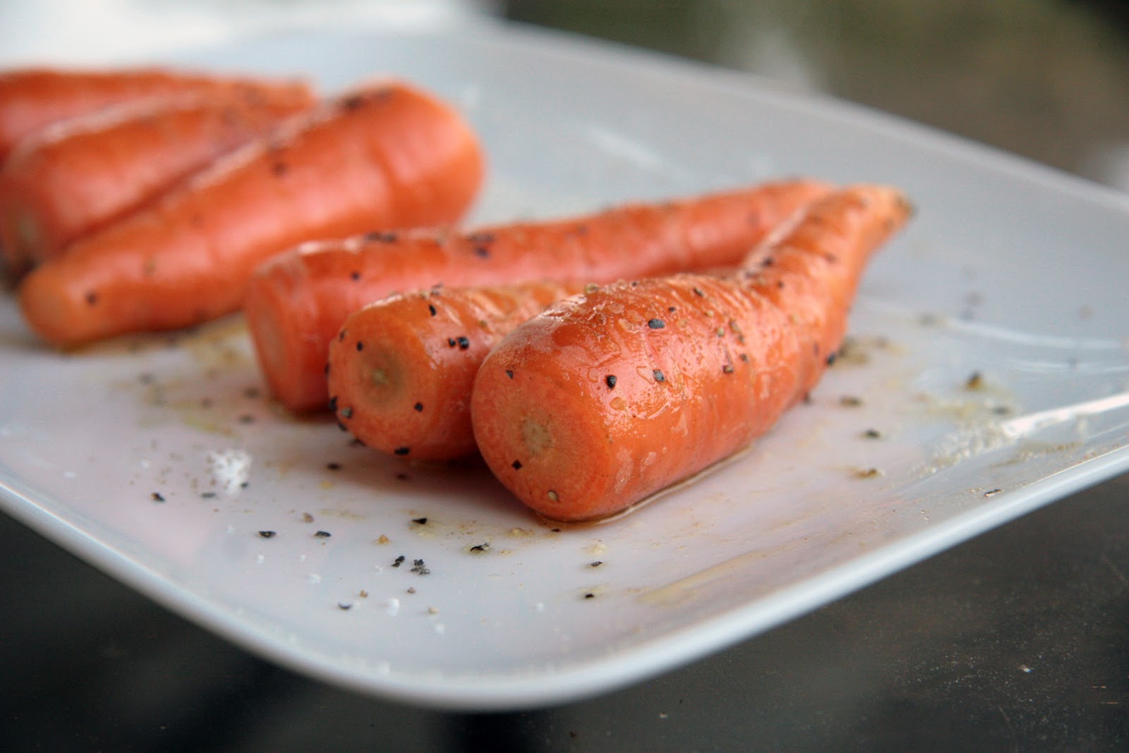 Seasoned baby carrots ready for grill