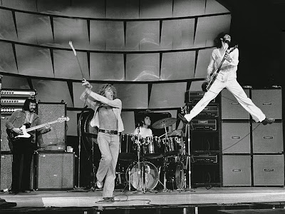 Pete Townshend THE WHO... and yes... I know the photo was enhanced lol! Not even Pete can catch THAT much air!!!