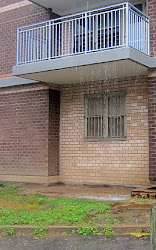 balcony rain pouring closer