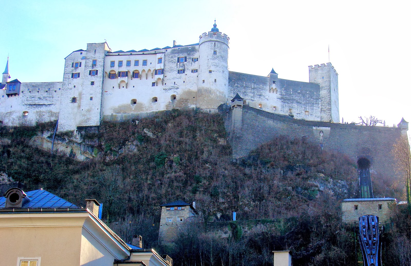 The magnificent Festung Hohensalzburg or Salzburg Castle houses three museums and can be reached via the funicular seen above and to the right of the image.
