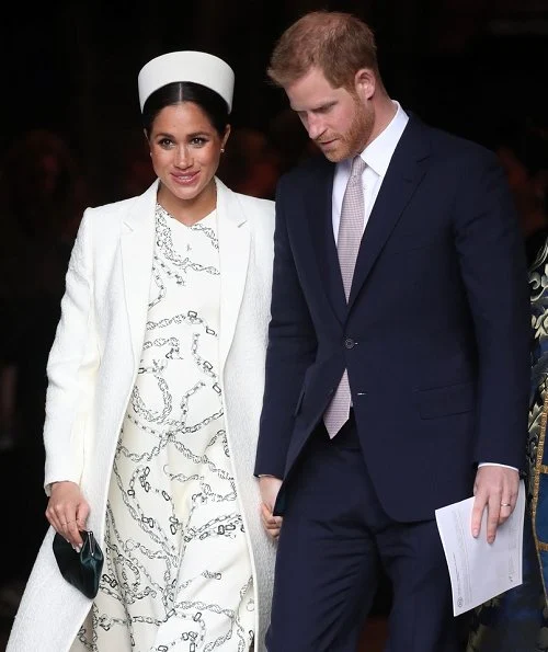 Meghan Markle wore Victoria Beckham printed crepe long sleeve midi dress, Kate Middleton wore a red coat by Catherine Walker